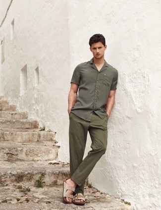 Olive Short Sleeve Shirt Outfits For Men: Such pieces as an olive short sleeve shirt and olive chinos are the ideal way to inject played down dapperness into your daily casual collection. Our favorite of a ton of ways to round off this outfit is a pair of beige suede sandals.