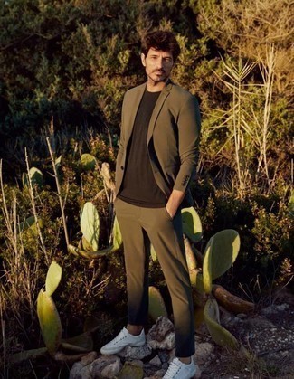 Tobacco T-shirt Outfits For Men: This combo of a tobacco t-shirt and an olive suit makes for the perfect base for an outfit. White canvas low top sneakers are a nice idea to round off this getup.