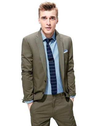 Dark Green Suit Outfits: Putting together a dark green suit with a light blue polka dot dress shirt is a smart choice for a dapper and elegant getup.