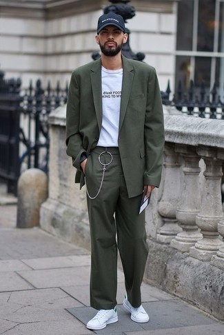 Olive Suit Outfits: This combination of an olive suit and a white and black print crew-neck t-shirt makes for the perfect base for a casually smart ensemble. For something more on the casually edgy end to complement your ensemble, add white and green canvas low top sneakers to the mix.