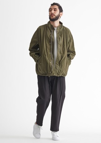 Men's Olive Windbreaker, White Crew-neck T-shirt, Black Chinos, White and Green Leather Low Top Sneakers