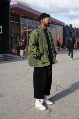 Olive Cardigan Warm Weather Outfits For Men: Rock an olive cardigan with black chinos to assemble a day-to-day look that's full of charisma and personality. A nice pair of white canvas high top sneakers is an effective way to punch up this ensemble.
