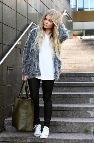 Black Leather Skinny Jeans Outfits: Why not rock a grey fluffy open cardigan with black leather skinny jeans? Both pieces are totally practical and will look fabulous matched together. If you wish to easily dress down your outfit with shoes, add white low top sneakers to the mix.