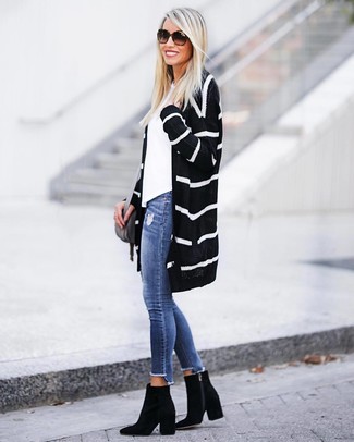 The go-to for knockout off-duty style? A black and white horizontal striped open cardigan with blue skinny jeans. You can get a little creative when it comes to footwear and complement your getup with black suede ankle boots.
