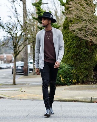 Dark Brown Sweatshirt Outfits For Men: Breathe style into your current arsenal with a dark brown sweatshirt and black ripped skinny jeans. Get a little creative in the footwear department and elevate your outfit by rounding off with black leather chelsea boots.
