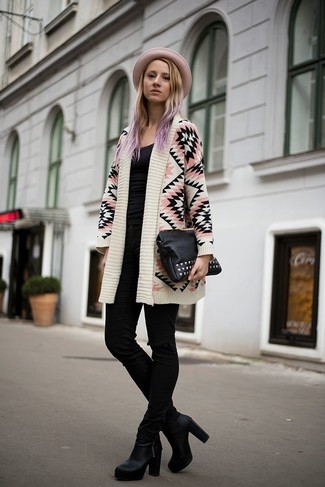Black and White Leather Clutch Casual Outfits: Go for a pared down but casually cool option by wearing a pink geometric open cardigan and a black and white leather clutch. A pair of black leather ankle boots instantly steps up the oomph factor of any outfit.
