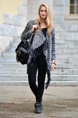 Black High Top Sneakers with Black Skinny Pants Outfits: A grey boucle open cardigan and black skinny pants are true staples if you're crafting an off-duty closet that matches up to the highest sartorial standards. Kick up this outfit by slipping into a pair of black high top sneakers.