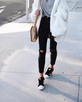 Women's White Chunky Open Cardigan, Grey V-neck T-shirt, Black Ripped Skinny Jeans, Black and White Low Top Sneakers