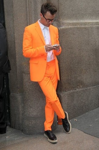 Mustard Dress Pants Outfits For Men: To look like a refined gentleman, make an orange blazer and mustard dress pants your outfit choice. For extra fashion points, add black leather derby shoes to the equation.