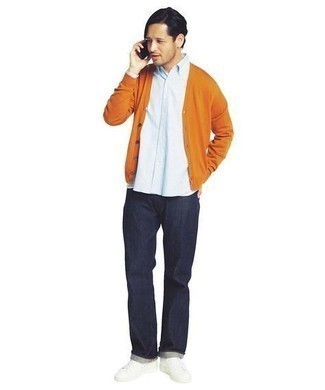 Men's Orange Cardigan, Light Blue Long Sleeve Shirt, Navy Jeans, White Canvas Low Top Sneakers