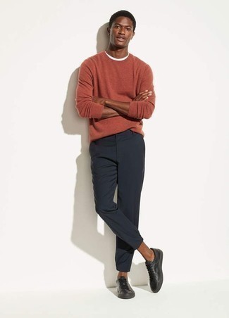 Mustard Crew-neck Sweater Outfits For Men: Fashionable and practical, this casual pairing of a mustard crew-neck sweater and navy chinos brings wonderful styling opportunities. For a more laid-back aesthetic, why not add a pair of black leather low top sneakers to the mix?