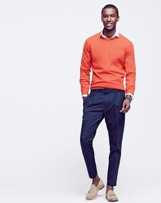 Orange Crew-neck Sweater Outfits For Men: Solid proof that an orange crew-neck sweater and navy dress pants look awesome together in an elegant getup for today's man. If in doubt as to the footwear, stick to a pair of beige suede tassel loafers.