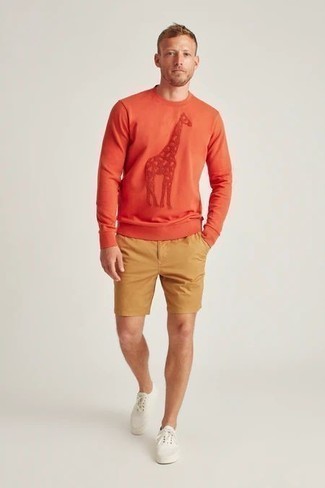 Orange Sweatshirt Outfits For Men: If you're on a mission for an off-duty but also stylish look, team an orange sweatshirt with tan shorts. All you need now is a pair of white canvas low top sneakers.