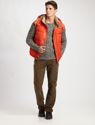 Dark Brown Suede Low Top Sneakers Outfits For Men: Dapper yet functional, this ensemble combines an orange gilet and dark brown jeans. Consider dark brown suede low top sneakers as the glue that ties your outfit together.