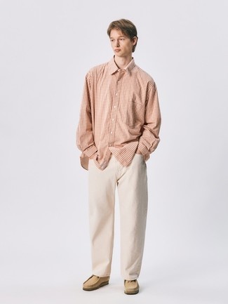 Beige Jeans Outfits For Men: For a laid-back ensemble, consider teaming an orange gingham long sleeve shirt with beige jeans — these two items play pretty good together. For a truly modern on and off-duty mix, complement your look with a pair of tan suede desert boots.
