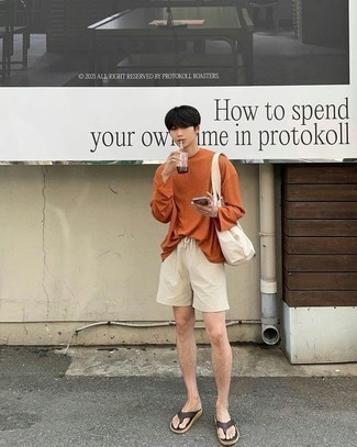 Flip Flops Outfits For Men: This relaxed casual combination of an orange long sleeve t-shirt and beige shorts comes to rescue when you need to look sharp in a flash. If you want to effortlessly tone down your ensemble with one single piece, why not complement your ensemble with a pair of flip flops?