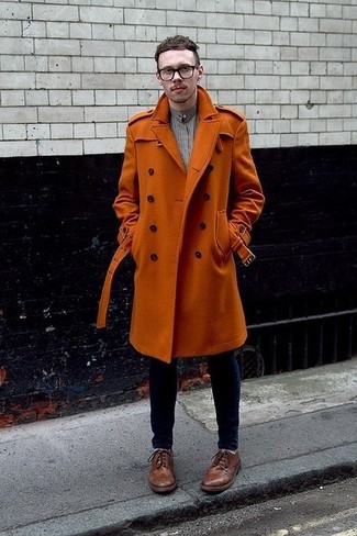 Orange Overcoat Outfits: For relaxed dressing with a modern twist, pair an orange overcoat with navy skinny jeans. Shake up your outfit by slipping into brown leather brogues.