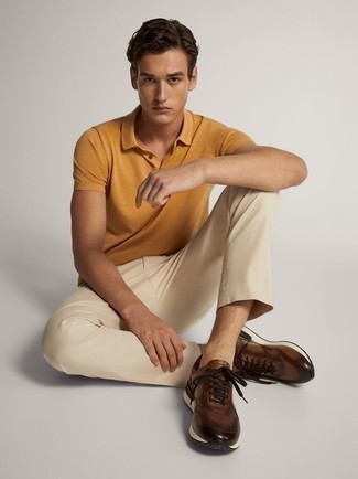 Mustard Polo Outfits For Men: A pulled together pairing of a mustard polo and beige chinos will set you apart effortlessly. A pair of brown athletic shoes will give casualness to your getup.