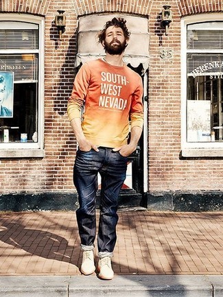 Orange Crew-neck Sweater Outfits For Men: This casual combination of an orange crew-neck sweater and navy jeans is perfect when you want to go about your day with confidence in your outfit. And if you wish to instantly perk up your outfit with footwear, introduce a pair of white suede derby shoes to the equation.