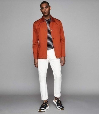 Orange Shirt Jacket Outfits For Men: For a look that's street-style-worthy and casually neat, consider pairing an orange shirt jacket with white chinos. Want to break out of the mold? Then why not complement this outfit with a pair of multi colored athletic shoes?