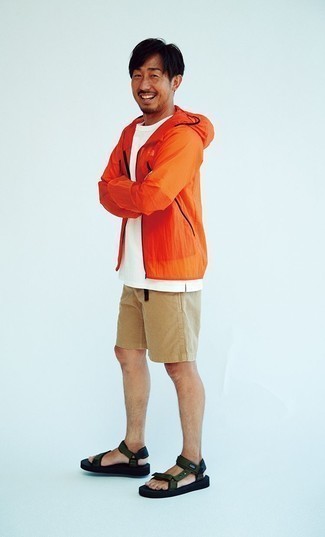 Yellow Windbreaker Outfits For Men: This combination of a yellow windbreaker and tan shorts is the perfect foundation for a ton of getups. When it comes to shoes, go for something on the relaxed end of the spectrum and complement this ensemble with a pair of dark green canvas sandals.
