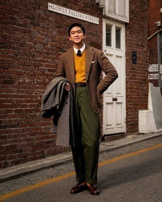 Charcoal Herringbone Overcoat Outfits: For a look that's sophisticated and envy-worthy, reach for a charcoal herringbone overcoat and olive dress pants. If in doubt as to the footwear, stick to a pair of dark brown leather tassel loafers.