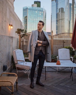 Dark Brown Leather Chelsea Boots Outfits For Men: A grey overcoat and navy jeans are among those versatile items that have become the fundamental elements in any modern gent's sartorial collection. Exhibit your refined side by finishing with dark brown leather chelsea boots.