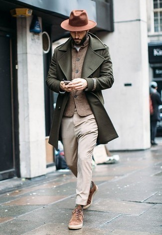 Dark Brown Suede Low Top Sneakers Outfits For Men: When the setting calls for a casually neat getup, wear an olive overcoat with beige chinos. Rounding off with a pair of dark brown suede low top sneakers is the most effective way to introduce a mellow touch to this look.