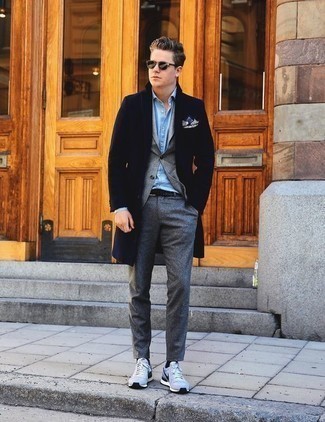 Light Blue Dress Shirt Chill Weather Outfits For Men: A light blue dress shirt and grey chinos are among those sport-anywhere-anytime items that have become the absolute staples in any man's wardrobe. Here's how to give a more relaxed touch to this outfit: light blue athletic shoes.