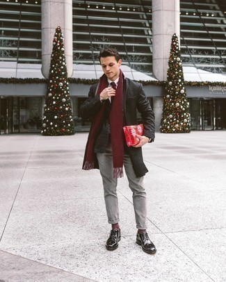 500+ Winter Outfits For Men: A charcoal overcoat and grey chinos paired together are a nice match. Want to dress it up in the footwear department? Introduce a pair of black leather oxford shoes to the equation. Dressing warmly is the trick to surviving below-freezing temps, but this ensemble proves that you can do it with style.