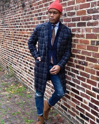 Tan Suede Desert Boots Outfits: A navy plaid overcoat and blue ripped jeans are great menswear essentials that will integrate well within your casual styling repertoire. If you wish to immediately up the style ante of your getup with one item, add a pair of tan suede desert boots to the equation.