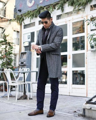 Charcoal Herringbone Overcoat Outfits: This combination of a charcoal herringbone overcoat and navy chinos is a surefire option when you need to look on-trend but have no extra time. If you want to immediately dress up your look with one piece, complement your outfit with brown leather loafers.