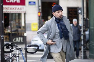 Navy Scarf Outfits For Men: Make a grey overcoat and a navy scarf your outfit choice, if you prefer to dress for comfort but also want to look stylish.