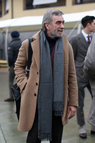 A camel overcoat and black chinos married together are a wonderful match.