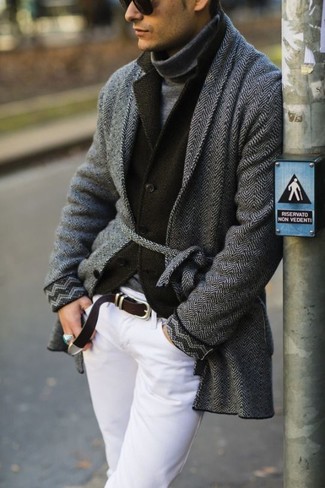 A grey herringbone overcoat and white chinos are among the basic elements of a functional wardrobe.
