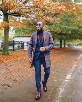 Multi colored Plaid Overcoat Outfits: Irrefutable proof that a multi colored plaid overcoat and blue dress pants look awesome when worn together in a polished ensemble for today's gentleman. Burgundy leather oxford shoes integrate perfectly within many combinations.