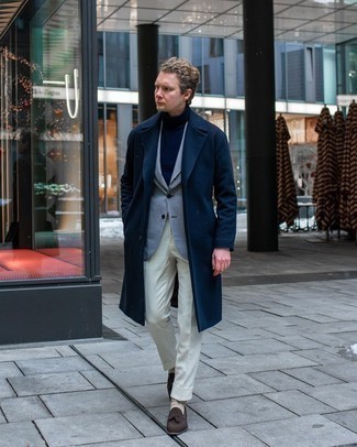Navy Coat Outfits For Men: Try teaming a navy coat with white dress pants if you're going for a neat, trendy look. Switch up your ensemble by slipping into a pair of dark brown suede tassel loafers.