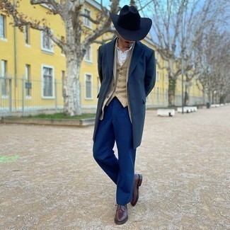Navy Wool Hat Outfits For Men: This combo of a navy overcoat and a navy wool hat is well-executed and yet it's comfortable enough and apt for anything. Complement your ensemble with a pair of dark brown leather derby shoes for a dash of refinement.