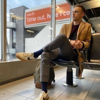 Cable Sweater Outfits For Men: This pairing of a cable sweater and grey check chinos is hard proof that a safe off-duty ensemble doesn't have to be boring. A pair of white and navy canvas low top sneakers is a winning footwear style here that's also full of personality.