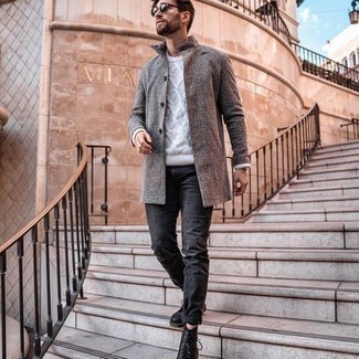 Charcoal Jeans Outfits For Men: Marrying a grey overcoat with charcoal jeans is an on-point idea for an effortlessly neat look. Black leather casual boots are a welcome addition to this ensemble.