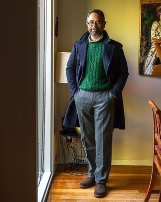 Dark Green Cable Sweater Outfits For Men: Definitive proof that a dark green cable sweater and grey wool dress pants look amazing when paired together in a classy ensemble for today's gent. For times when this ensemble looks all-too-dressy, dial it down by wearing a pair of dark brown suede desert boots.