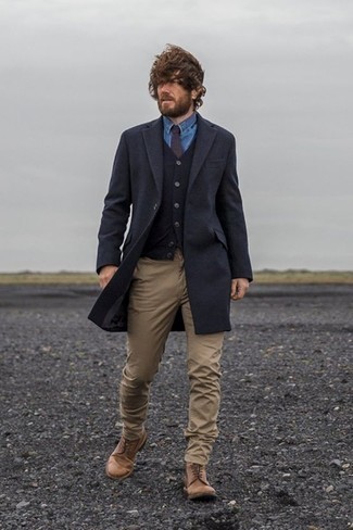 Navy Overcoat Outfits: A navy overcoat and khaki chinos paired together are a smart match. When not sure about what to wear on the footwear front, add brown leather casual boots to the mix.