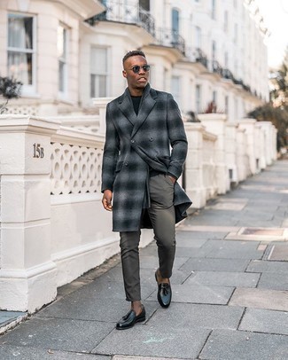 Charcoal Plaid Overcoat Outfits: Wear a charcoal plaid overcoat and grey chinos for a proper elegant menswear style. Finishing off with a pair of black leather tassel loafers is a surefire way to add some extra definition to your look.
