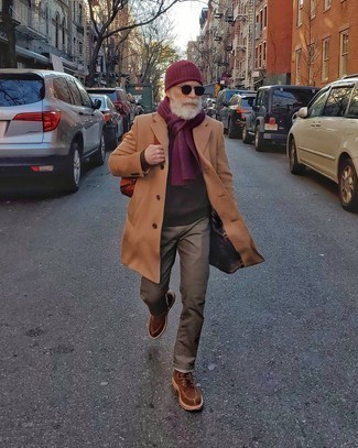 Red Beanie Outfits For Men: For an outfit that's super simple but can be flaunted in a ton of different ways, consider pairing a camel overcoat with a red beanie. Let your sartorial chops truly shine by rounding off this outfit with a pair of brown suede casual boots.
