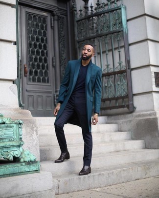 Teal Overcoat Outfits: This pairing of a teal overcoat and navy chinos is hard proof that a pared down look doesn't have to be boring. Clueless about how to finish this ensemble? Rock dark brown leather chelsea boots to dial up the classy factor.