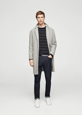 Navy Horizontal Striped Crew-neck Sweater Outfits For Men: Marry a navy horizontal striped crew-neck sweater with navy jeans for knockout menswear style. Complement this look with white leather low top sneakers et voila, the outfit is complete.