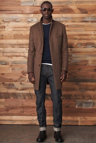 Navy Crew-neck Sweater Cold Weather Outfits For Men: For a casually stylish outfit, wear a navy crew-neck sweater with charcoal jeans — these two items work really well together. Want to play it up in the footwear department? Add a pair of black leather casual boots to your ensemble.