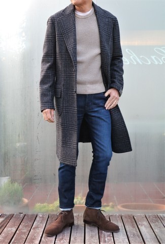 Charcoal Plaid Overcoat Outfits: This combination of a charcoal plaid overcoat and navy jeans oozes sophisticated menswear style. Brown suede desert boots are a welcome accompaniment to this look.