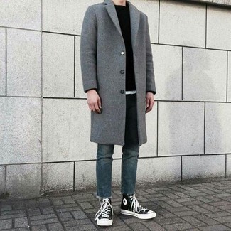 Grey Overcoat Outfits: Make a grey overcoat and navy jeans your outfit choice for laid-back refinement with an alpha male finish. To give your outfit a more casual feel, why not introduce a pair of black and white canvas high top sneakers to the mix?