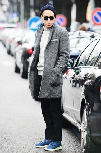 Charcoal Herringbone Overcoat Outfits: A charcoal herringbone overcoat and black chinos are the kind of a tested ensemble that you need when you have no extra time. Complete your ensemble with a pair of blue leather low top sneakers to instantly dial up the street cred of this getup.
